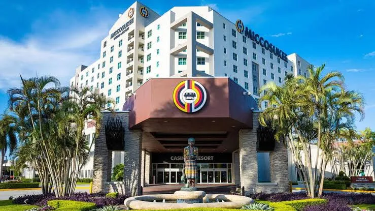 Waterfront arrival and hotel entrance setting